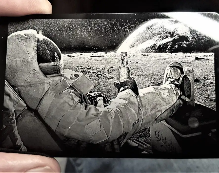 Engraved Alumina Ceramic Laminate ie. Anodized Aluminium Surface Showing Astronaut